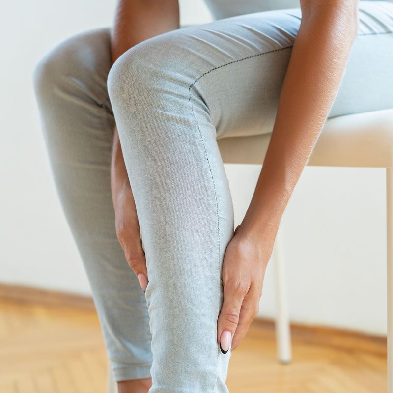 lady holding legs